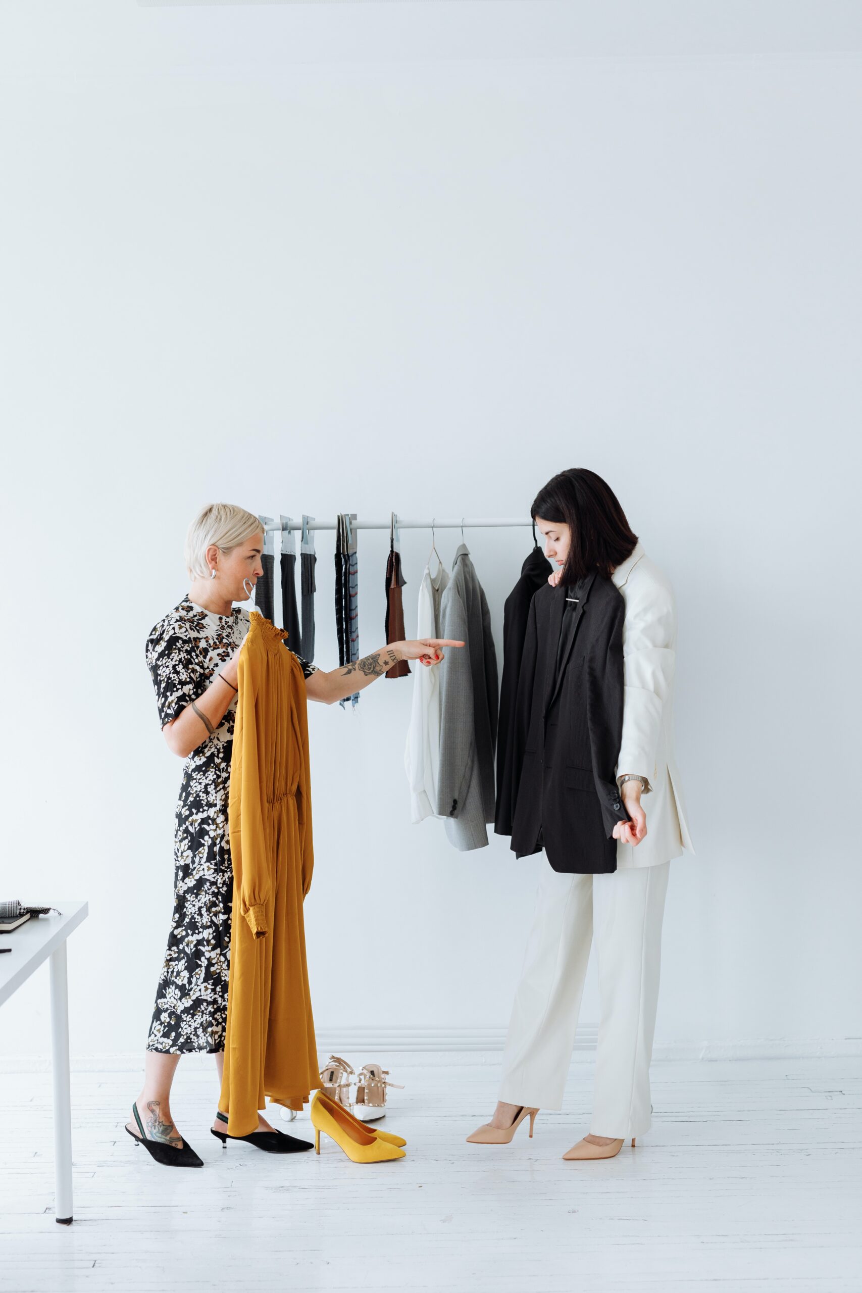 a-woman-fitting-a-black-blazer
