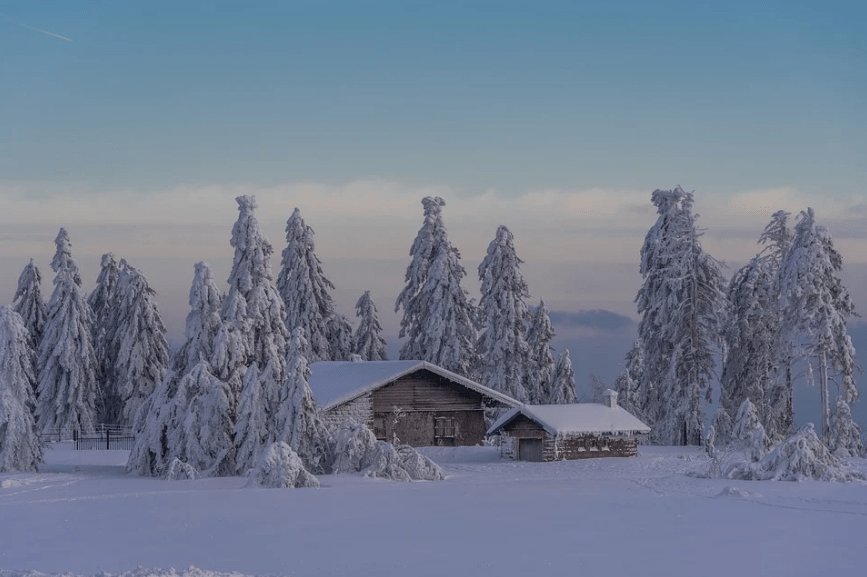 house almost buried with snow