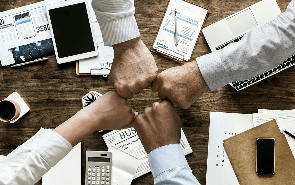 fists joined together forming a square
