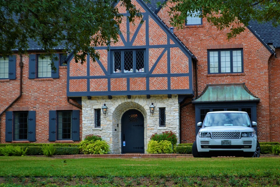 brick house with huge lawn
