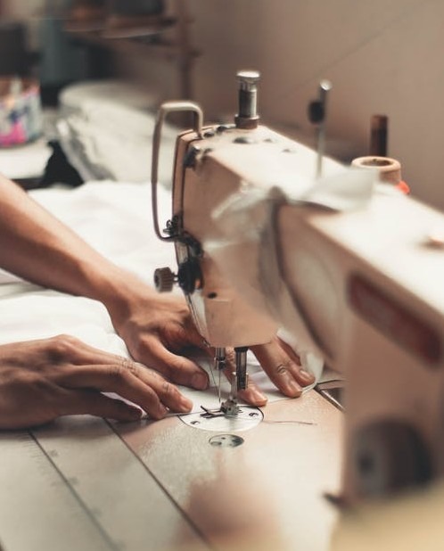 A Person Working on Sewing Machine
