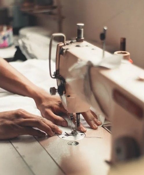 A Person Working on Sewing Machine