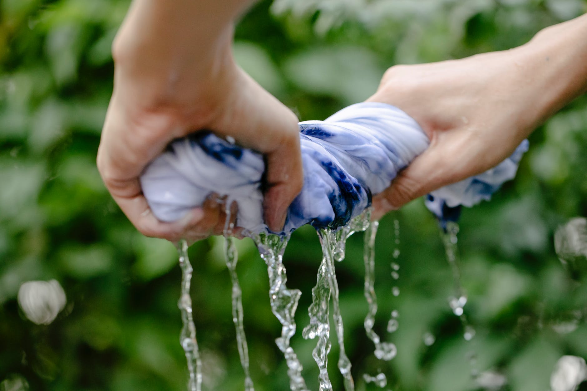 hand washing, squeezing the cloth