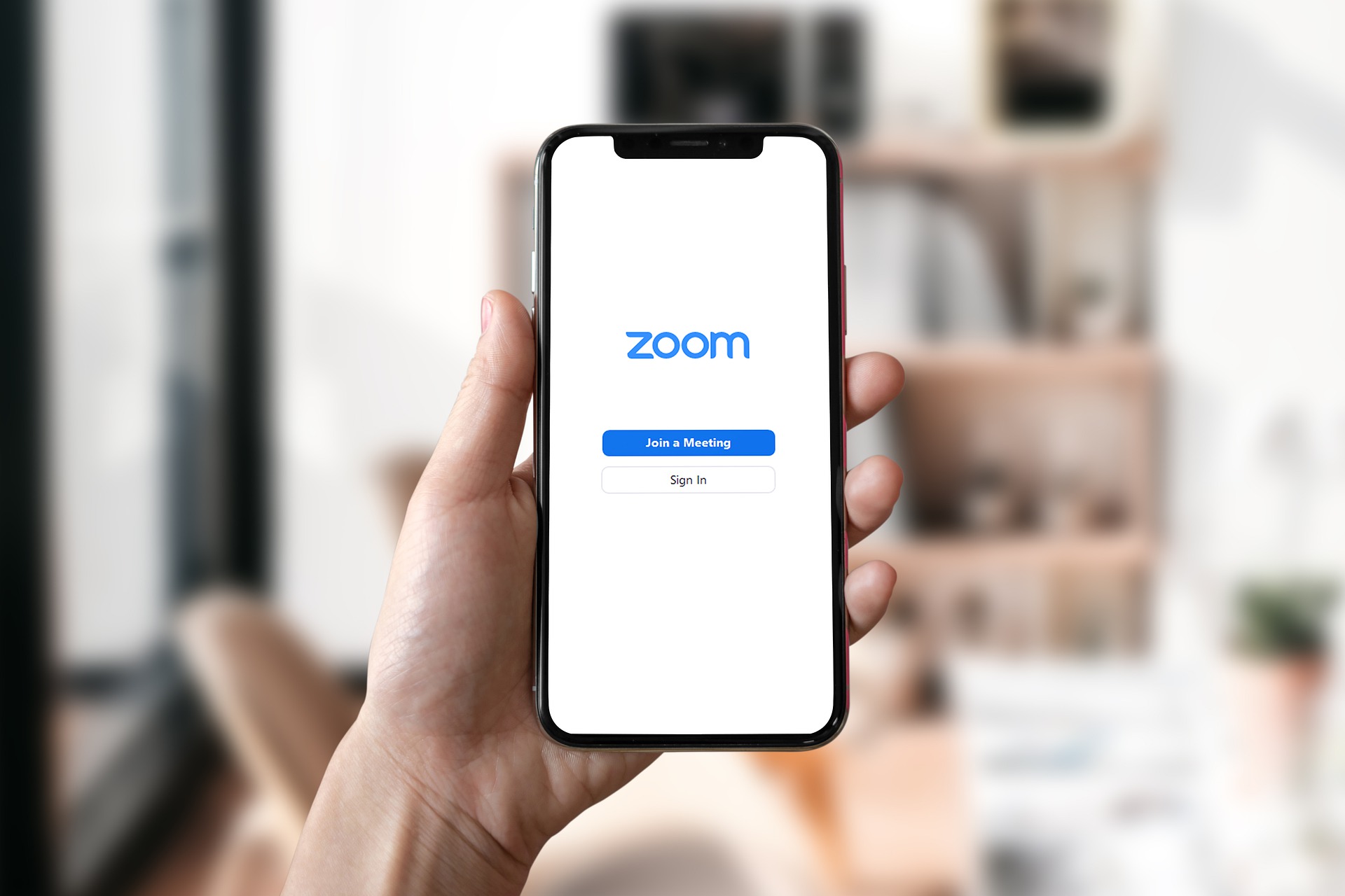 phone opening the Zoom application
