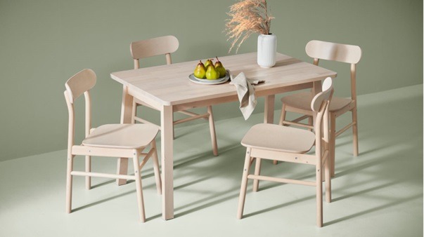 A dining table with chairs