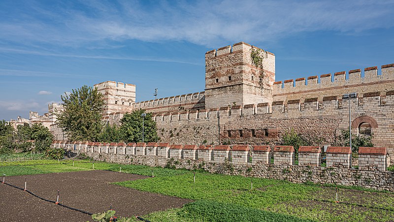 A part of the old Constantinople walls with towers in Istanbul, Turkey